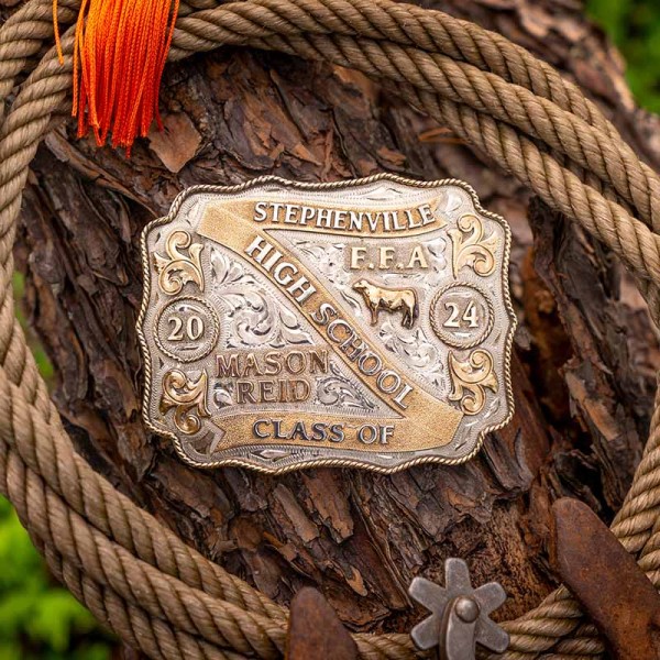 A custom belt buckle for Stephenville High School Class of 2024 with personalized name featuring a bronze cow figure and the FFA initials